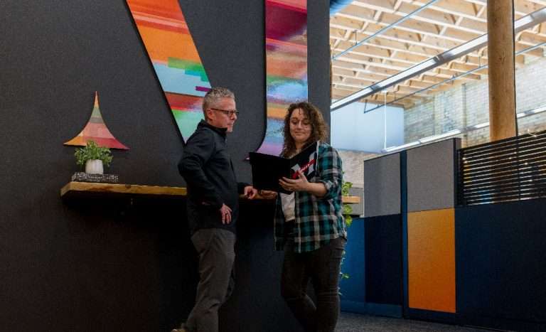 Image showing team members discussing a project